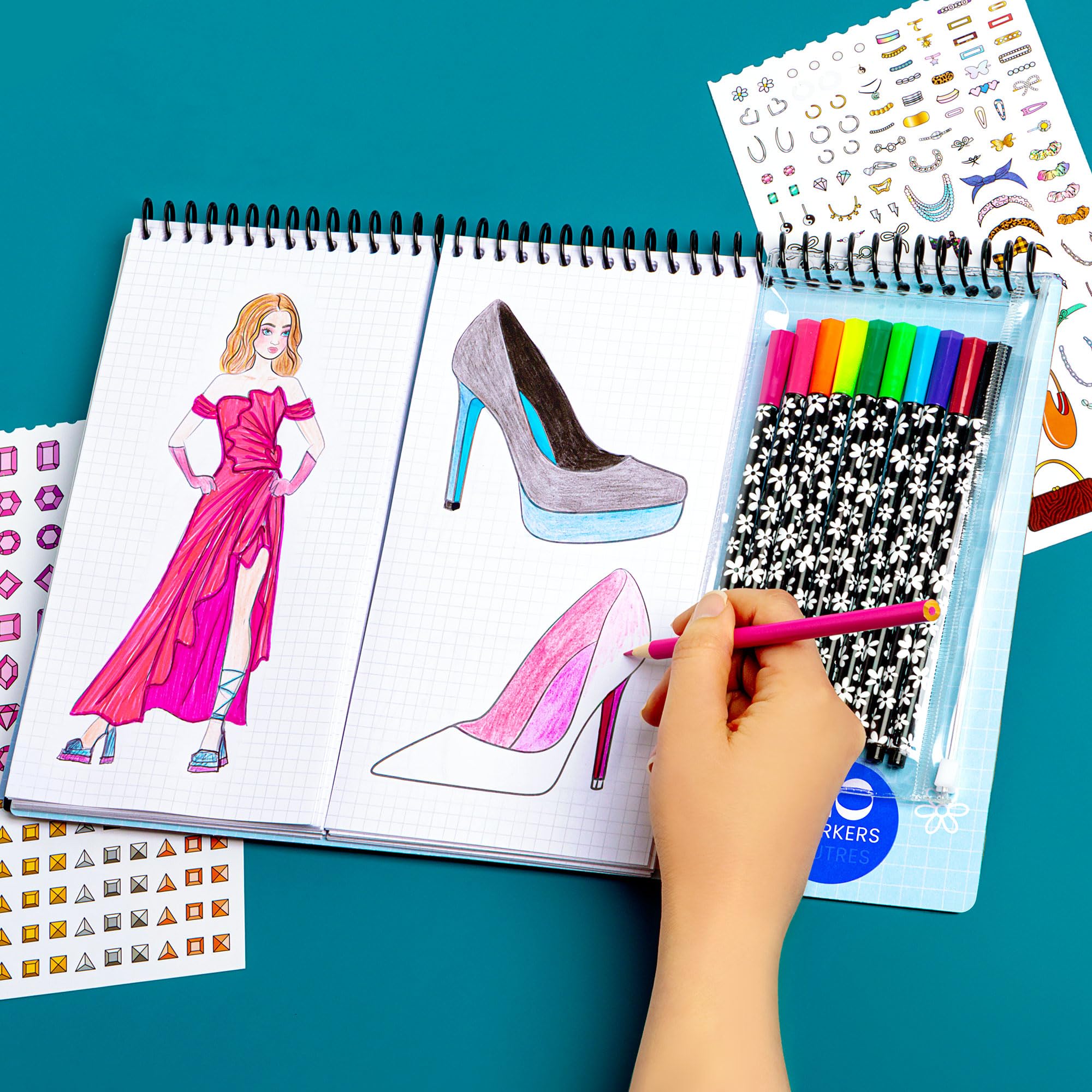 Fashion Angels spiral-bound sketchbook for on-the-go design ideas.