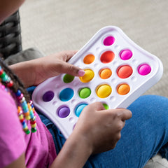 Fat Brain Dimpl Pops squishy silicone bubbles provide satisfying tactile feedback.