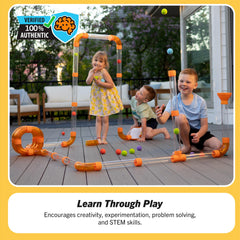 Fat Brain Toys Air Toobz foam balls in flight for dynamic STEM play.