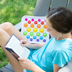 Fat Brain Toys Dimpl Pops Deluxe compact design ideal for travel and on-the-go play.