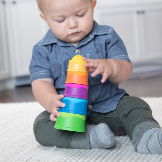 Fat Brain Toys Dimpl Stack nesting cups for order and spatial awareness during play.