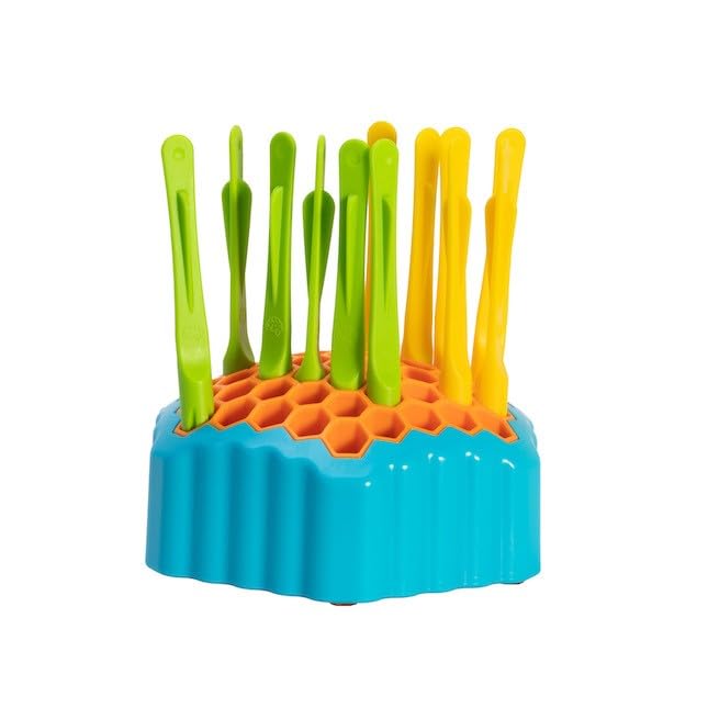 Close-up of yellow and green arrows from Fat Brain Toys Drop Shot for precise aiming.