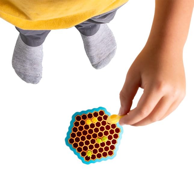 Box and contents of Fat Brain Toys Drop Shot, including 12 arrows and game board.
