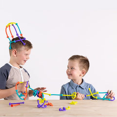Fat Brain Toys Plip Kit color palette highlights vibrant silicone tones.