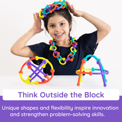 Fat Brain Toys Plip Kit creative structure with modular silicone pieces in action.