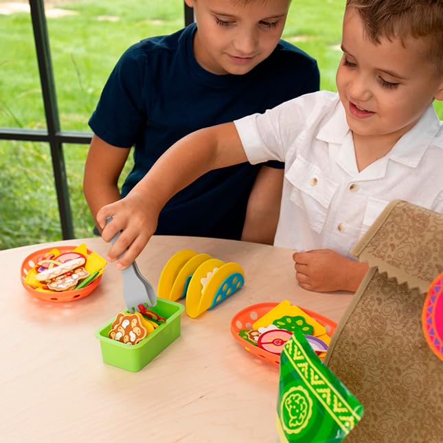 Fat Brain Toys Pretendables Nacho Set tongs for picking items during role play meals.