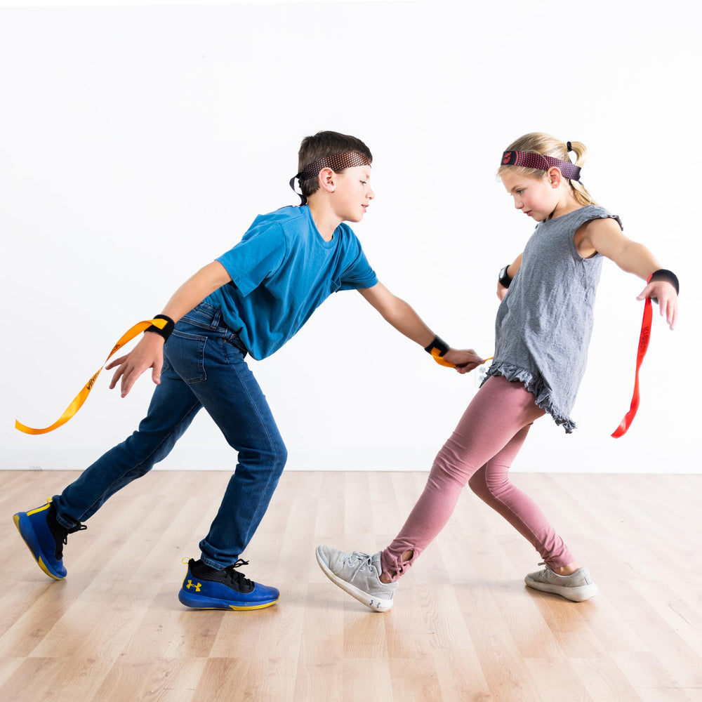 Kids ready to play Fat Brain Toys Ribbon Ninja Game
