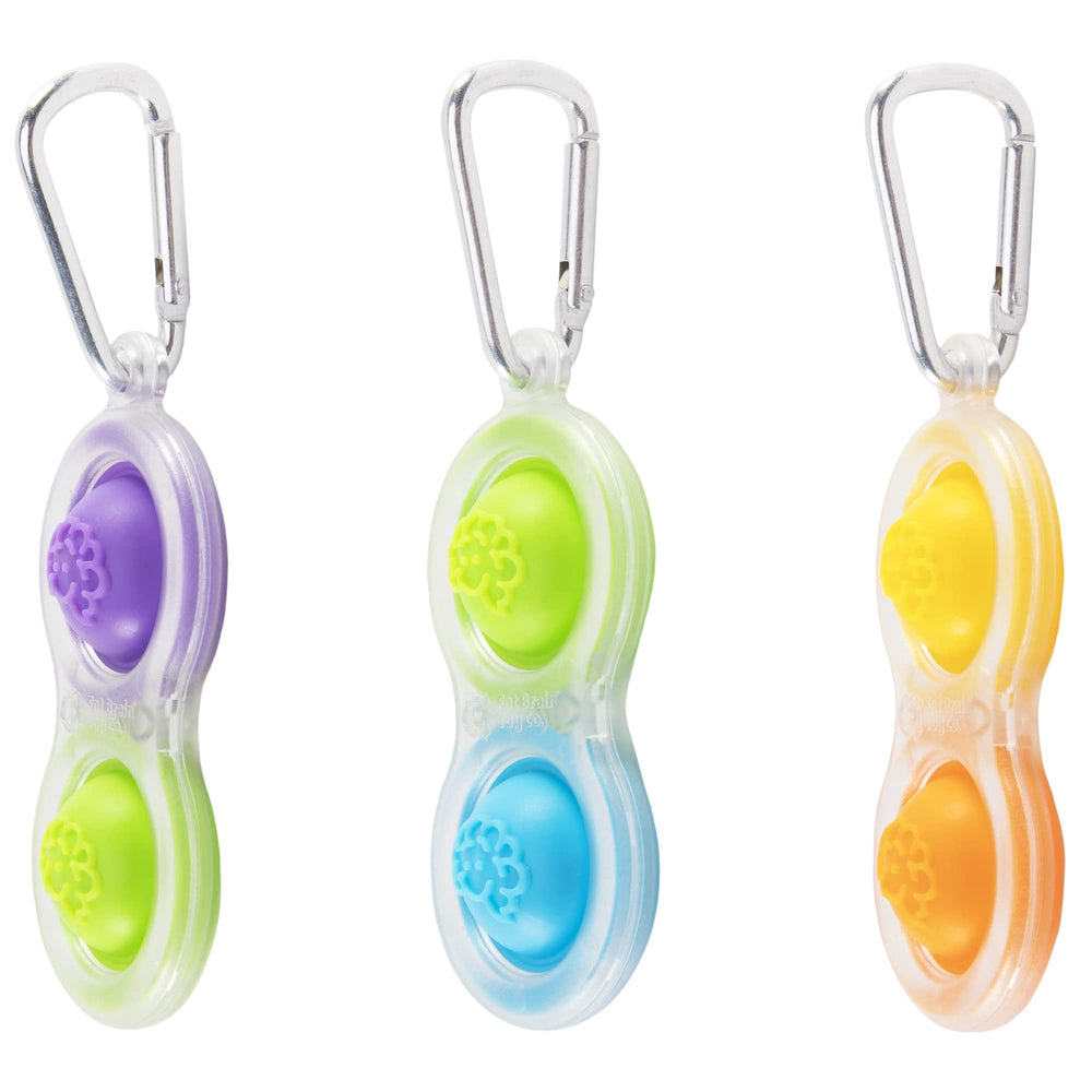 Fat Brain Toys Simpl Dimpl Clear 3 Pack close-up; satisfying pops for fidget-friendly play.