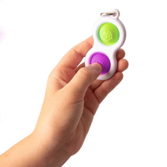 Fat Brain Toys Simpl Dimpl clip securely attaches to keys for quick fidget access.