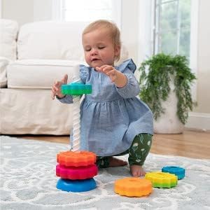Fat Brain Toys SpinAgain pole-pull-action demonstrating cause-and-effect as discs tumble.
