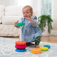 Fat Brain Toys SpinAgain pole-pull-action demonstrating cause-and-effect as discs tumble.