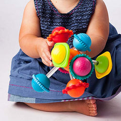 Wimzle promotes fine motor play through twisting and spinning.