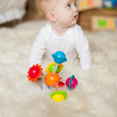 Compact Wimzle fits small hands for grab-and-go play.