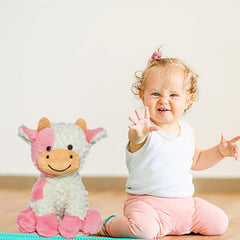 FAYUAKU cow stuffed animal in a hugging pose; great for bedtime comfort.