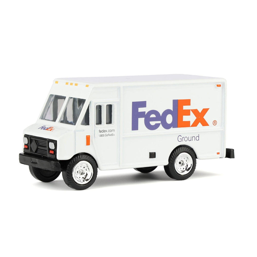 FedEx Ground 1/64 scale truck front view showcasing iconic livery for display.