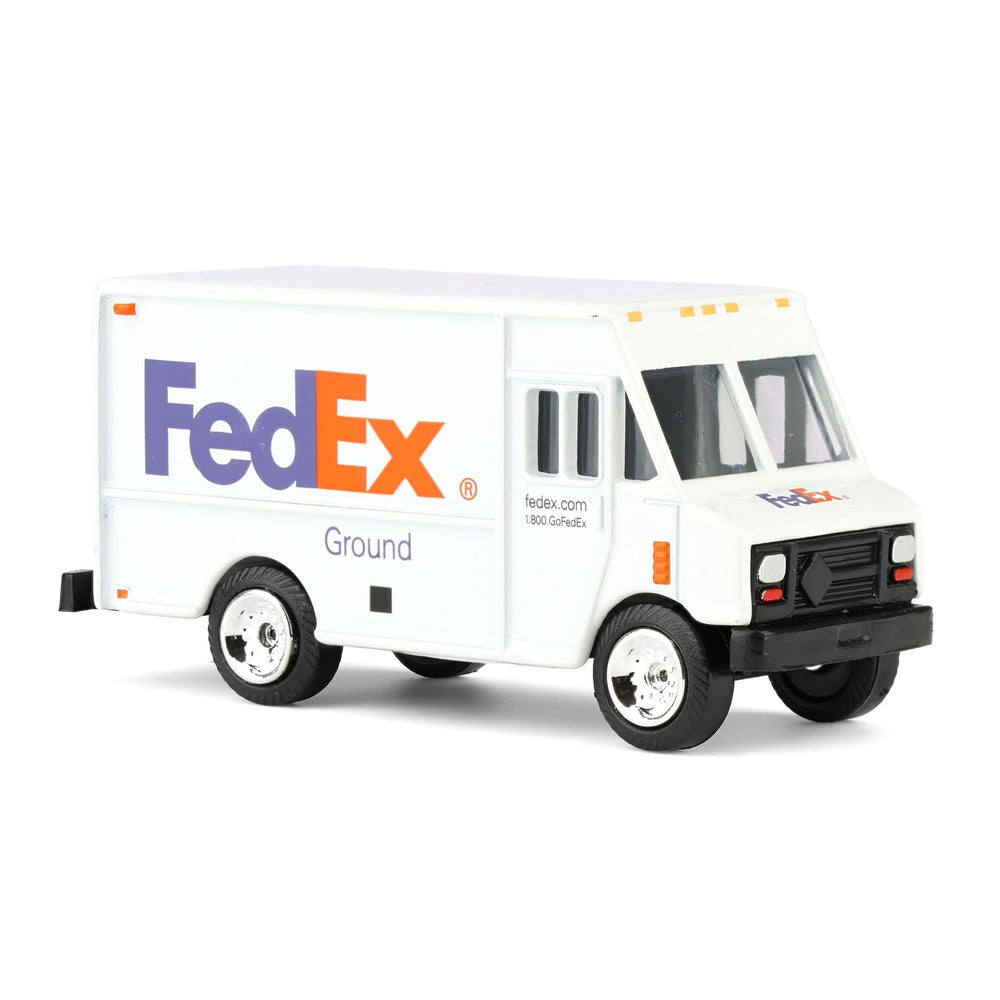 FedEx Ground 1/64 scale truck side view ideal for diorama setups.