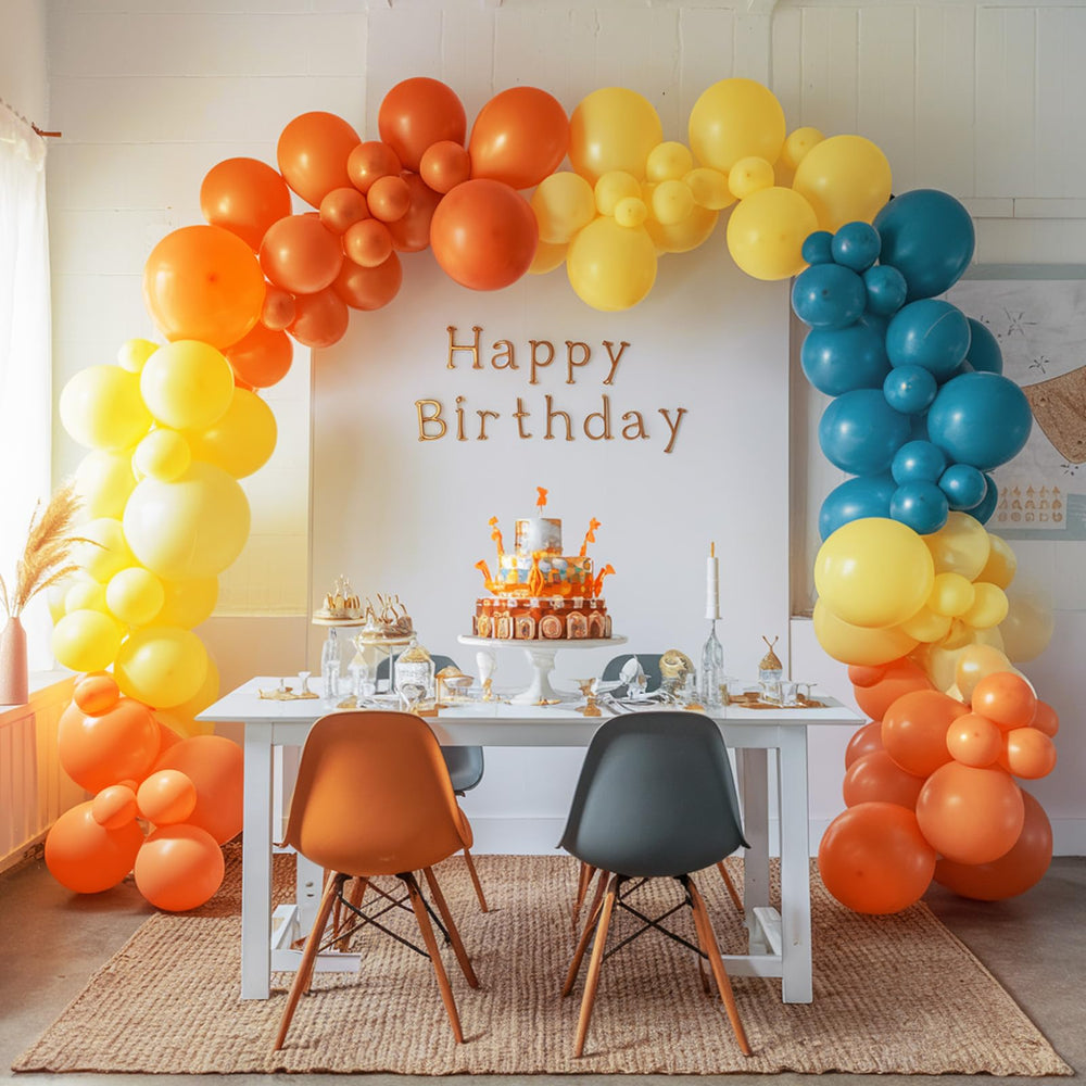 FEYG baby shower display with slate blue and mustard accents enhances decor