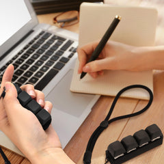Ferreve purple wrist-strap fidget keychain for on-the-go focus