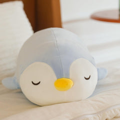 FFxiong penguin plush pillow styled as a bright room decor accent