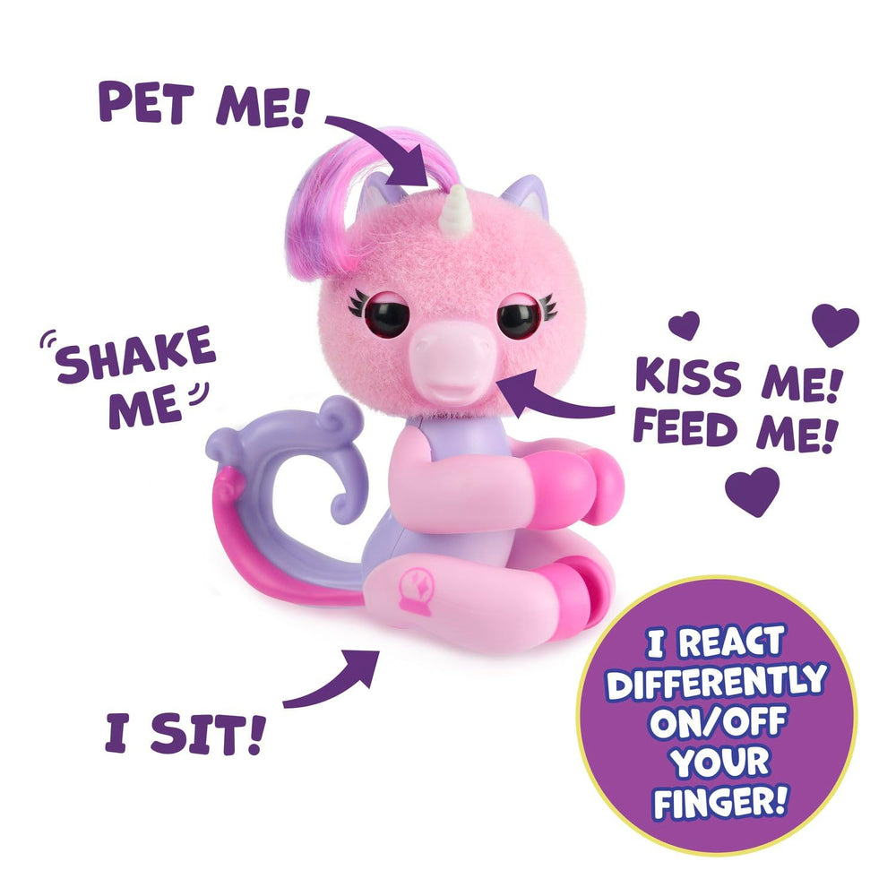 Fingerlings Mimi pink touch sensors on head and belly for responsive play.