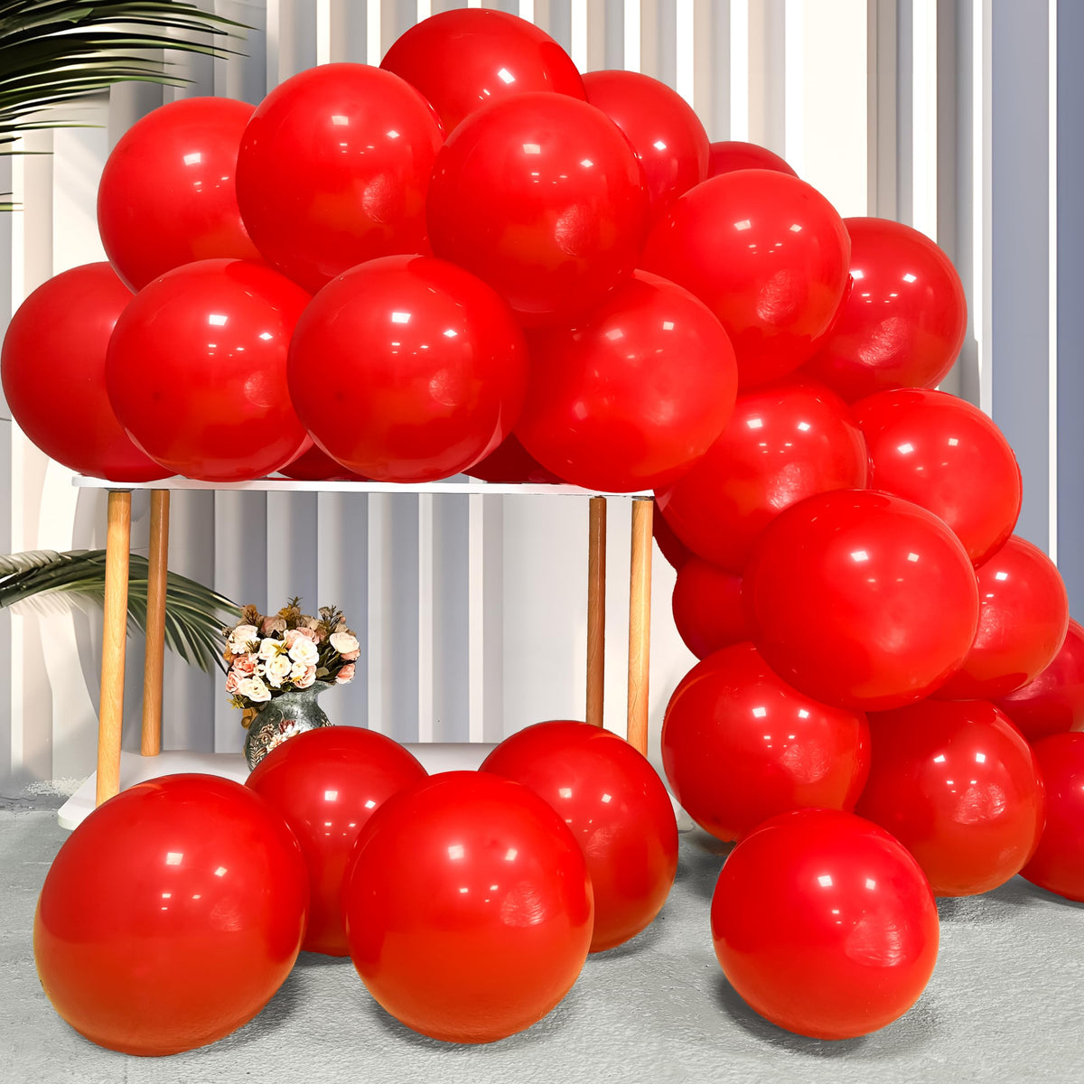 Firomi red 12-inch balloons for durable, vibrant birthday party decor.