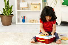 Five double sided records provide ten tunes on the Fisher Price Classics Record Player