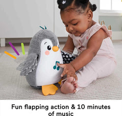 Fisher-Price Flap & Wobble Penguin in musical play mode with gentle tunes.