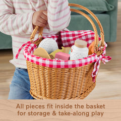 Fisher-Price gingham picnic blanket provides a cozy, tactile play surface