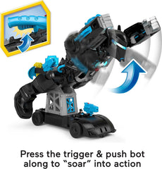 Fisher-Price Imaginext Bat-Tech Batbot cockpit shows Batman figure in action.