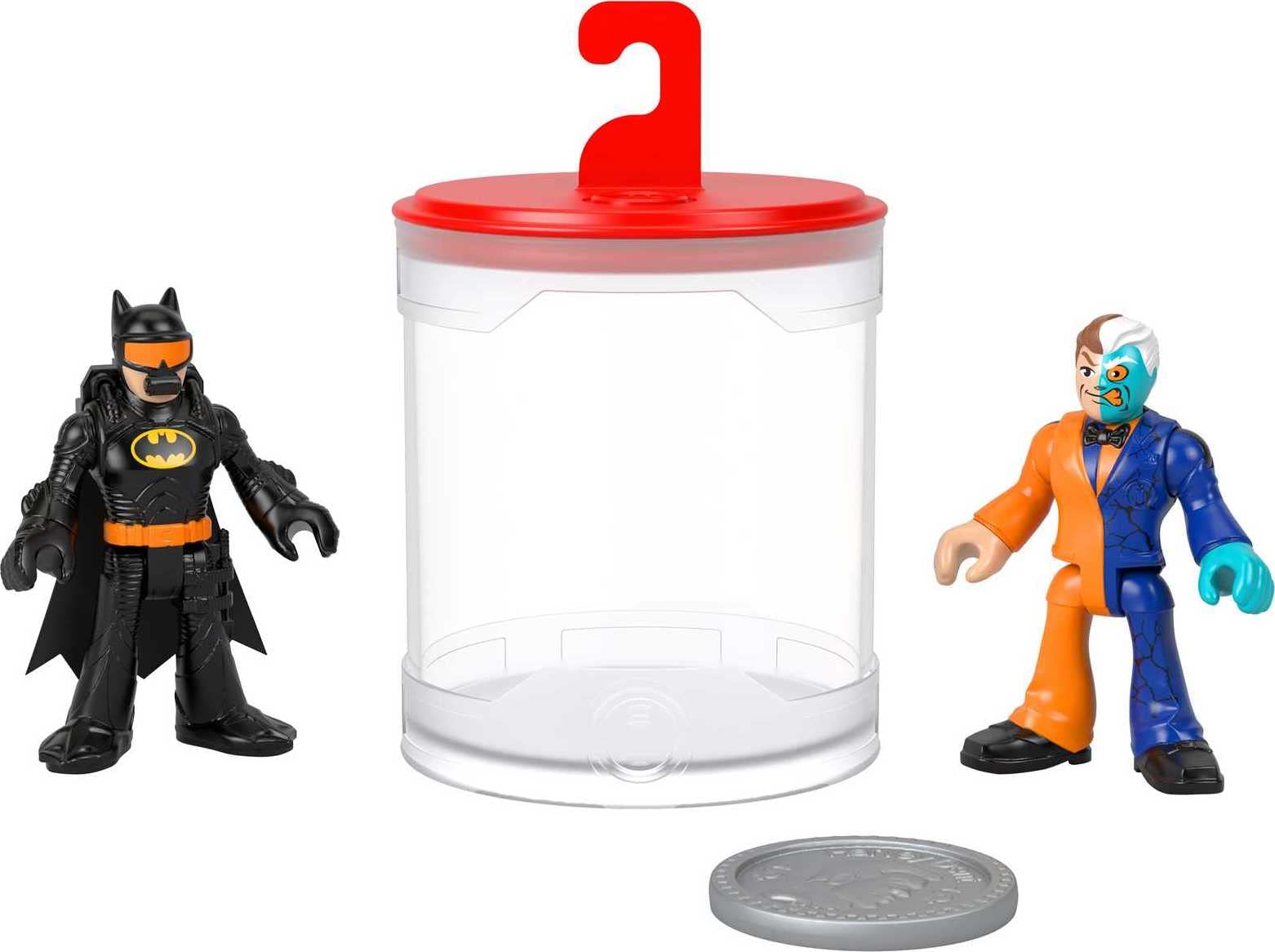 Fisher-Price Imaginext Batman color changer figure dunking in warm water reveals new colors.
