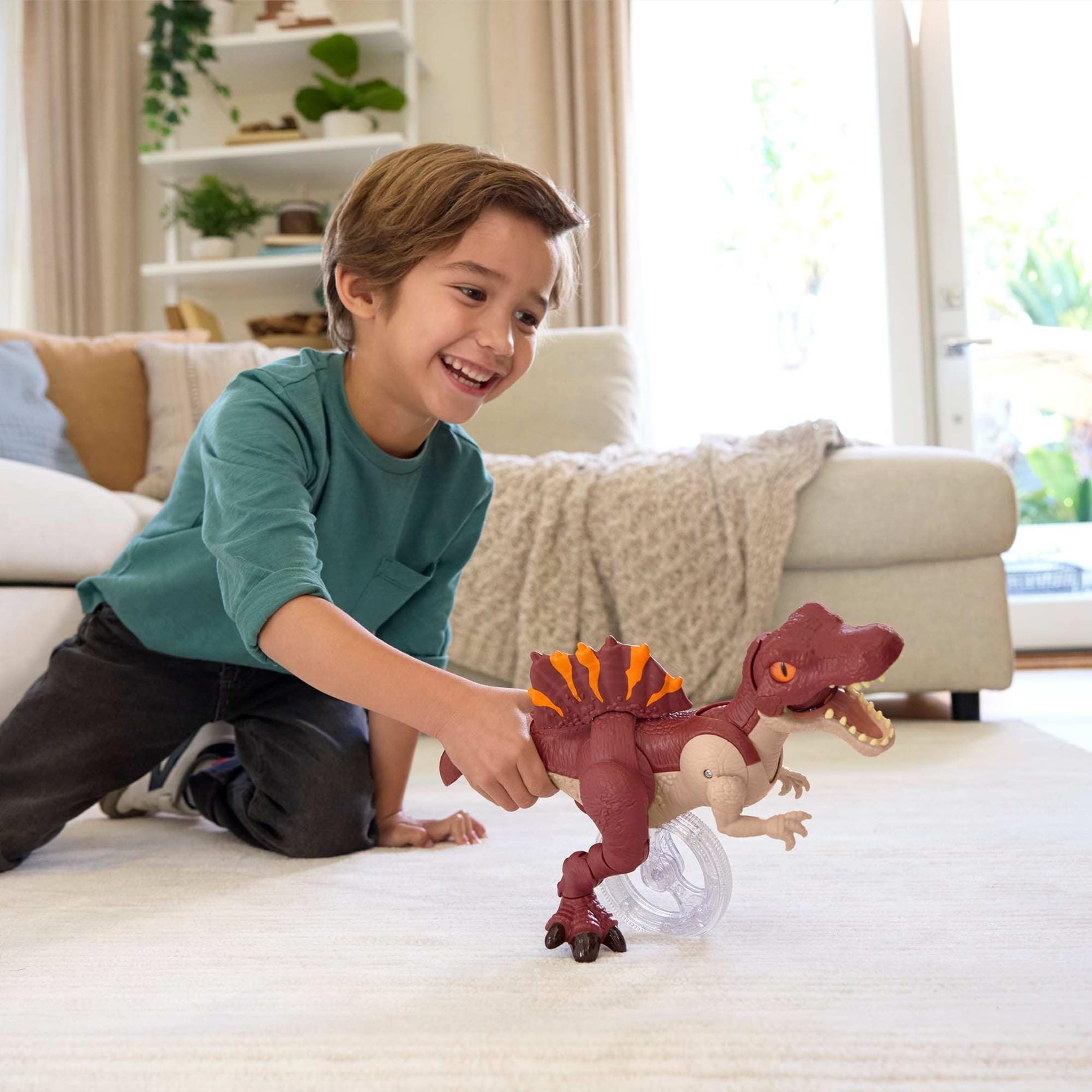 Fisher-Price Imaginext Sprinting Spinosaurus with tail trigger action for dynamic storytelling.