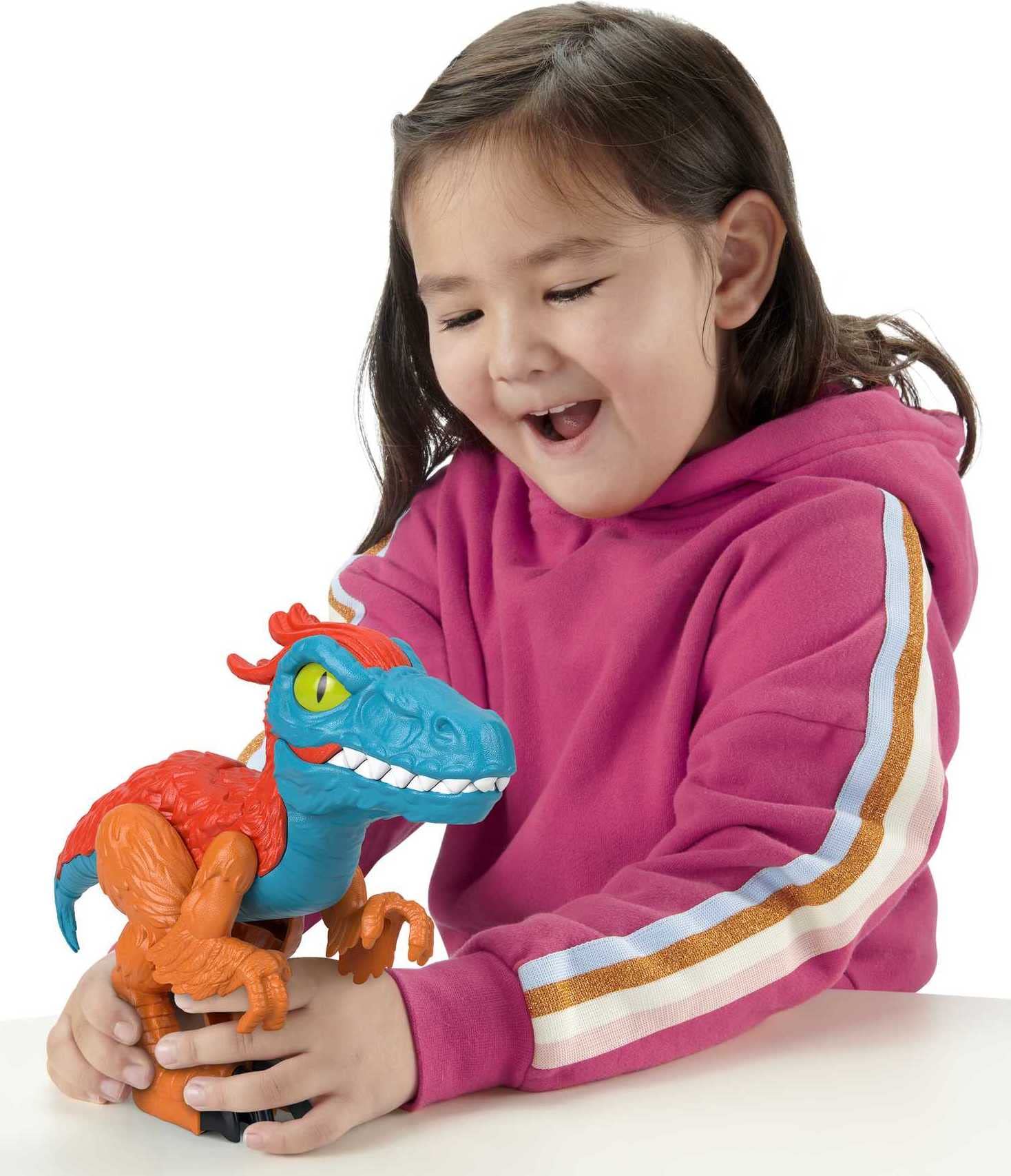 Fisher-Price Imaginext Pyroraptor XL with movable arms and legs for action play.
