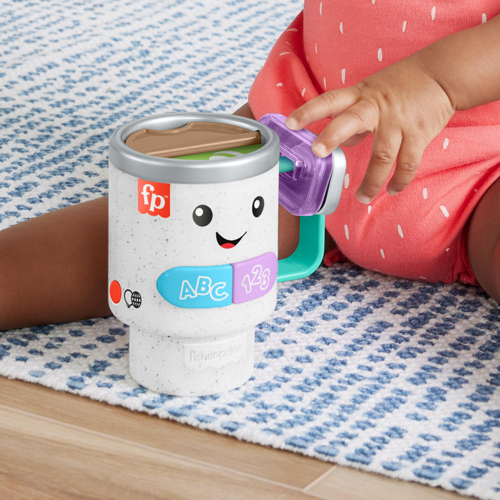 Fisher-Price Laugh & Learn coffee mug features a language globe for English, German, or French play.
