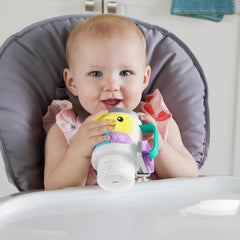 Fisher-Price Laugh & Learn coffee mug offers 20+ songs and phrases to spark language exploration.