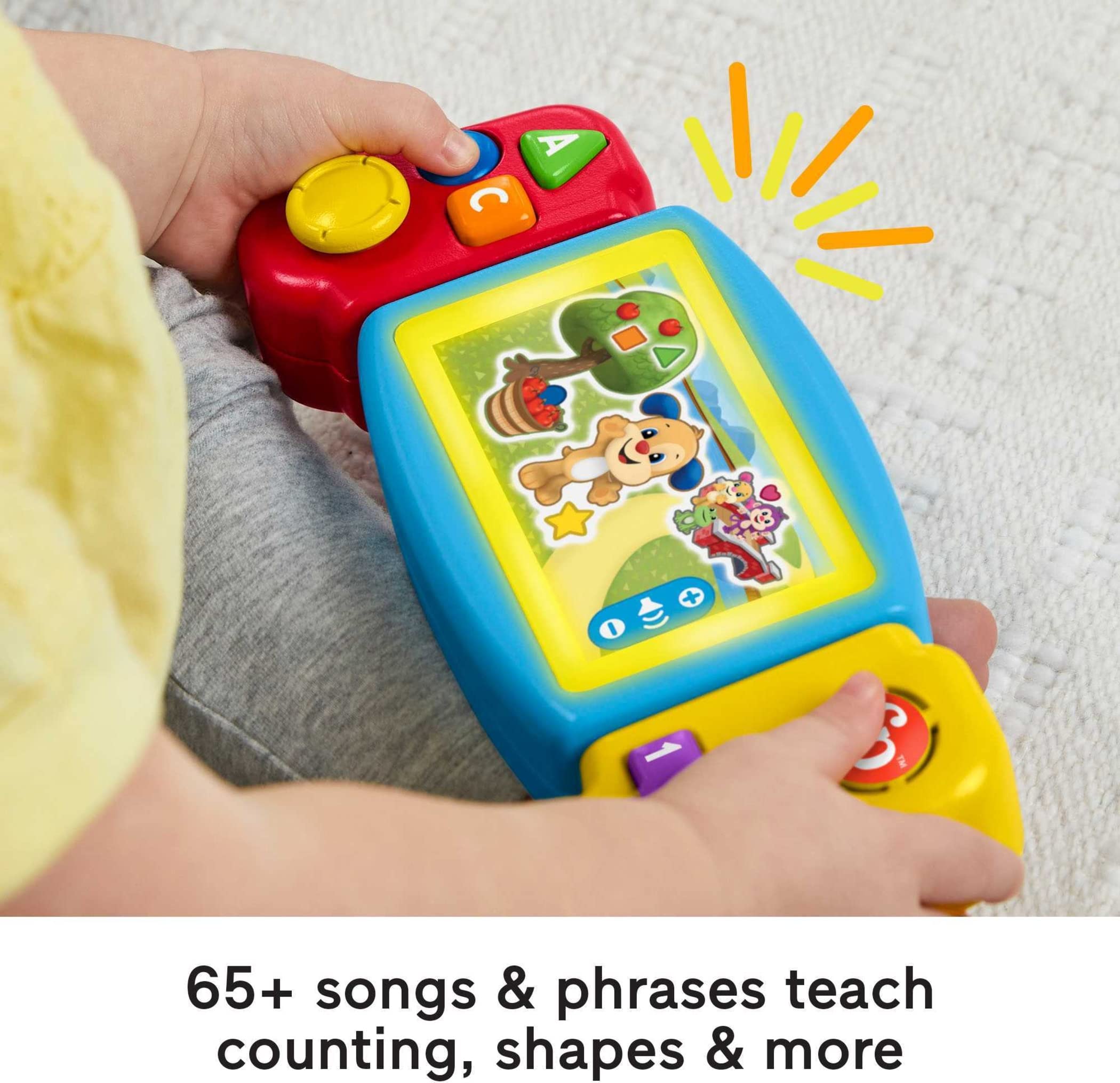 Fisher-Price Laugh and Learn Gamer D-pad view highlights colorful lights during learning moments.