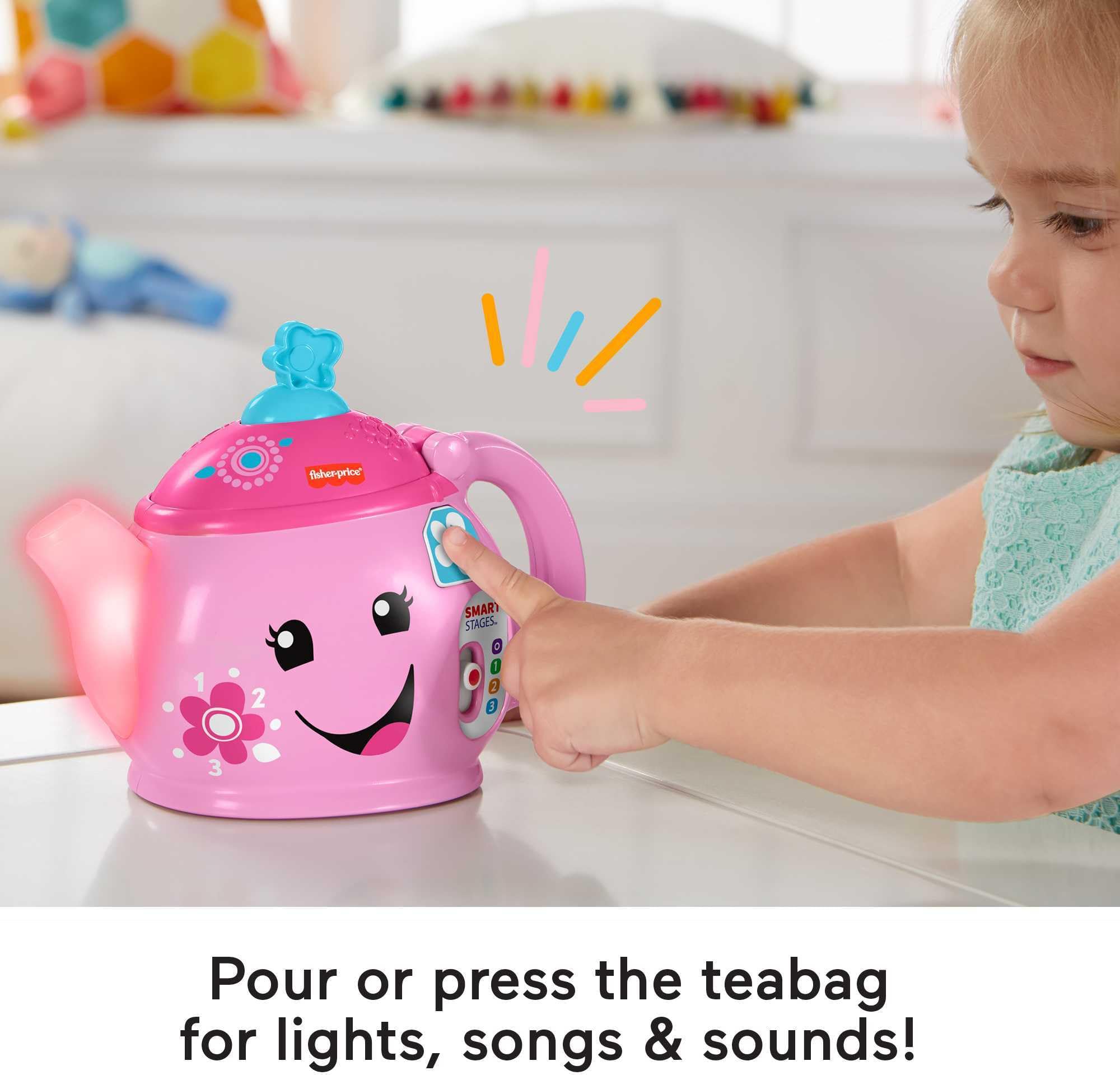 Fisher-Price Laugh & Learn spoon and pieces support pretend sharing and fine motor play