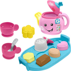 Fisher-Price Laugh & Learn teapot lights up during pour play, encouraging pretend tea time