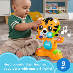 Fisher-Price Link Squad Tiger microphone light highlights beat-synced visuals for sensory fun.