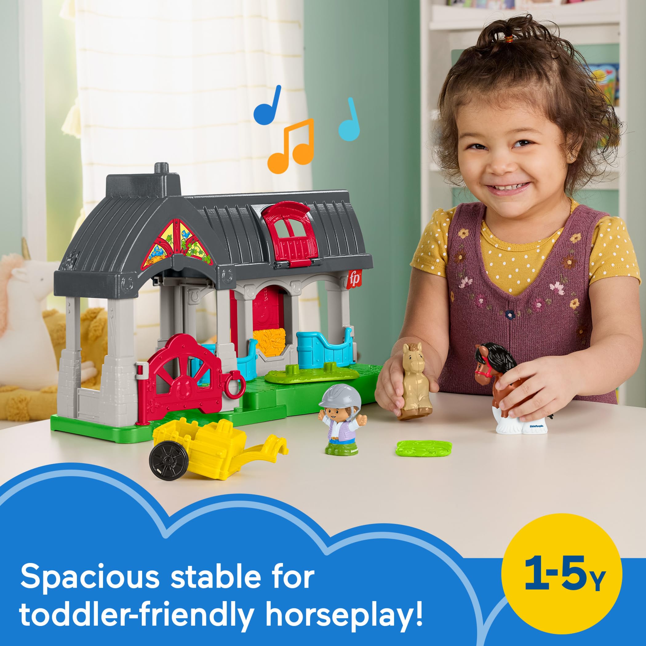 Fisher-Price Little People carousel spins to activate sounds during imaginative rides