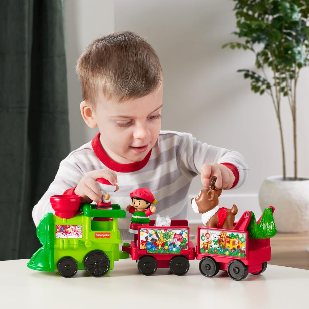 Fisher-Price Little People Christmas train car 1 with festive details for imaginative stories.