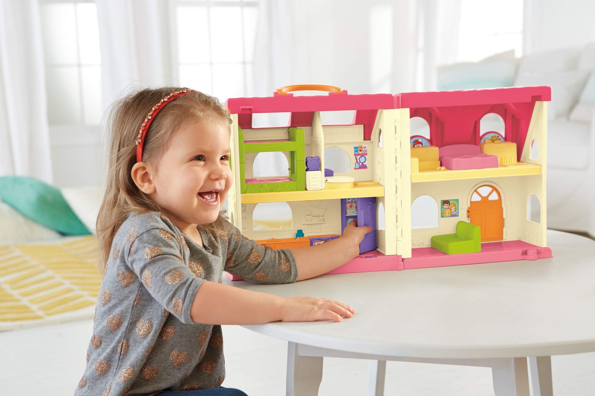 Fisher-Price Little People oven and fridge doors illuminate for interactive learning