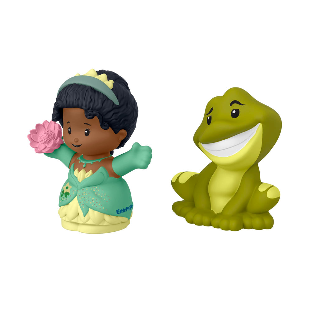 Toddler hands grasping Fisher-Price Little People Tiana Naveen figures for easy manipulation