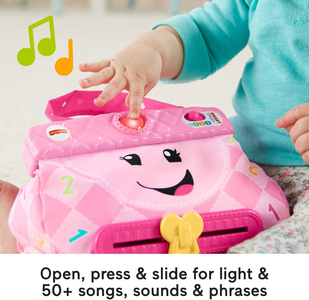 Fisher-Price My Smart Purse compact mirror supports self-awareness in play.