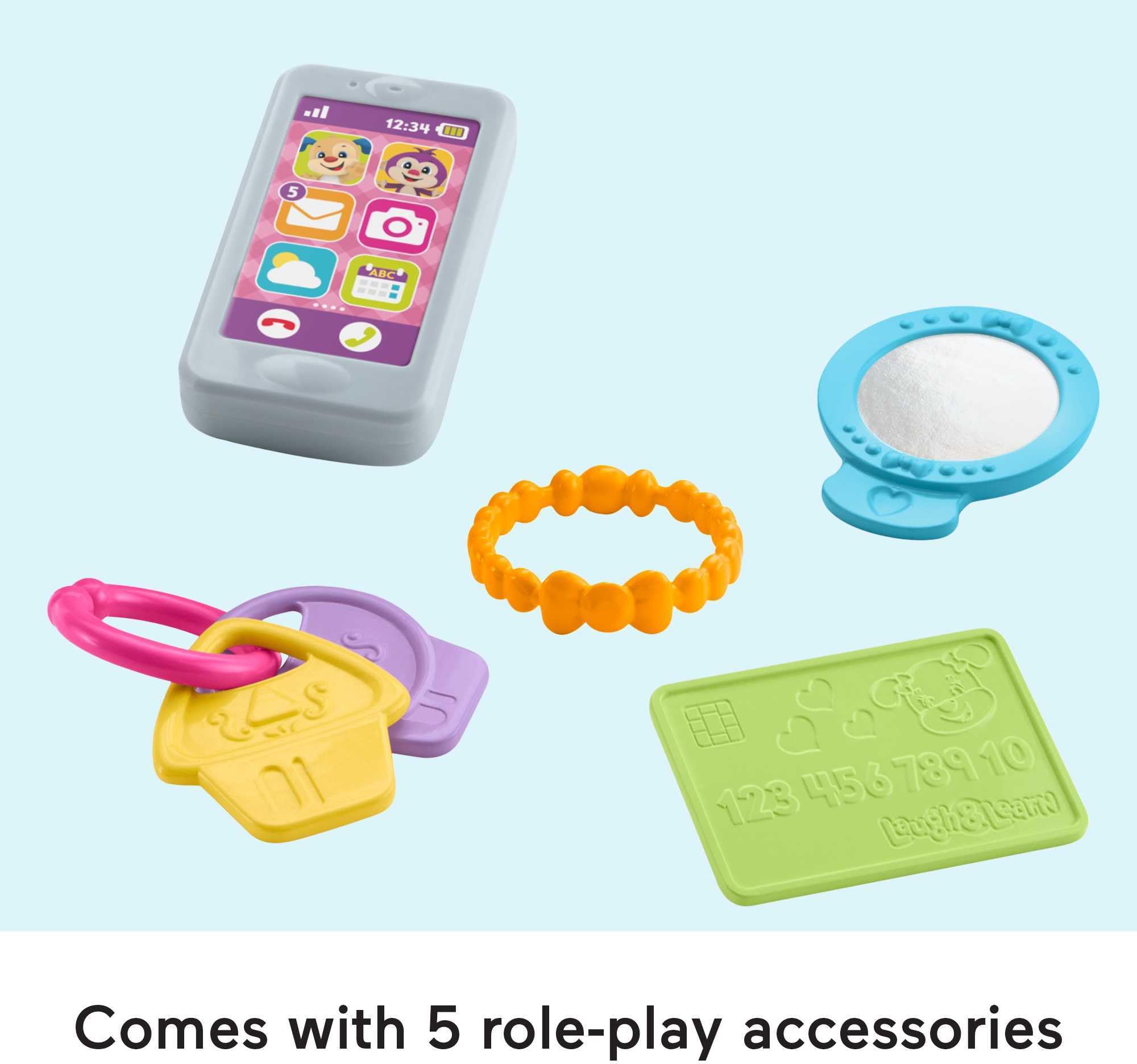 Fisher-Price My Smart Purse credit card accessory enhances dress-up moments.