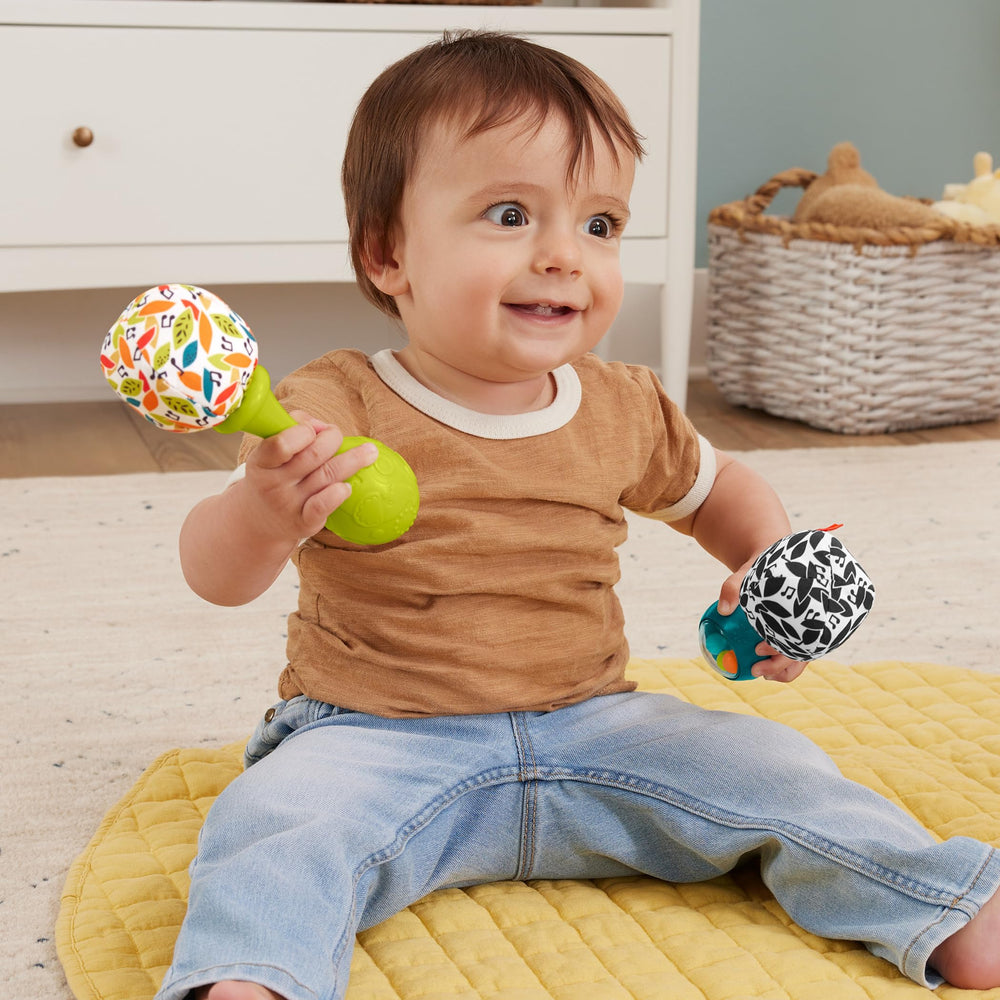 Fisher-Price maracas with colorful beads create engaging rattle sounds for baby play.