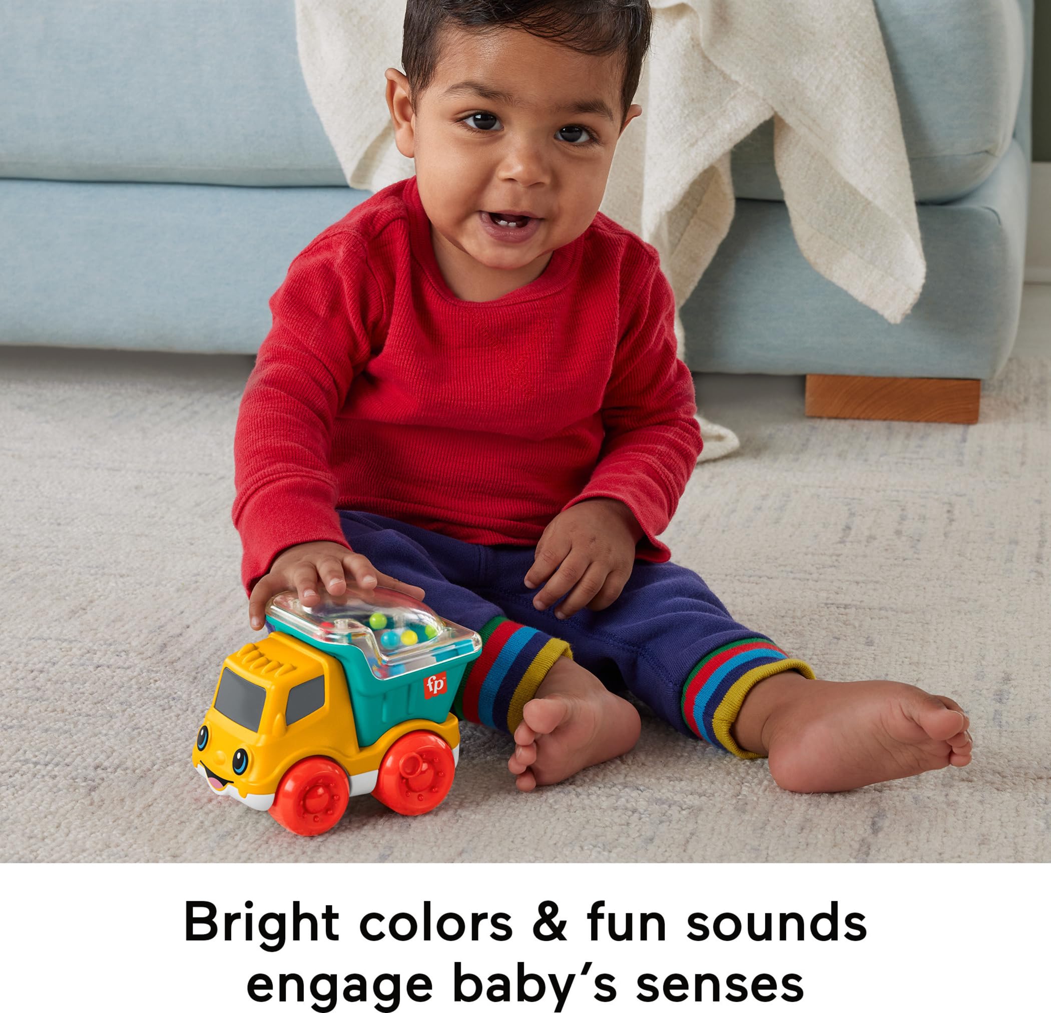 Fisher-Price Poppity Pop Dump Truck bright colors and friendly face support visual engagement