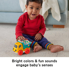 Fisher-Price Poppity Pop Dump Truck bright colors and friendly face support visual engagement