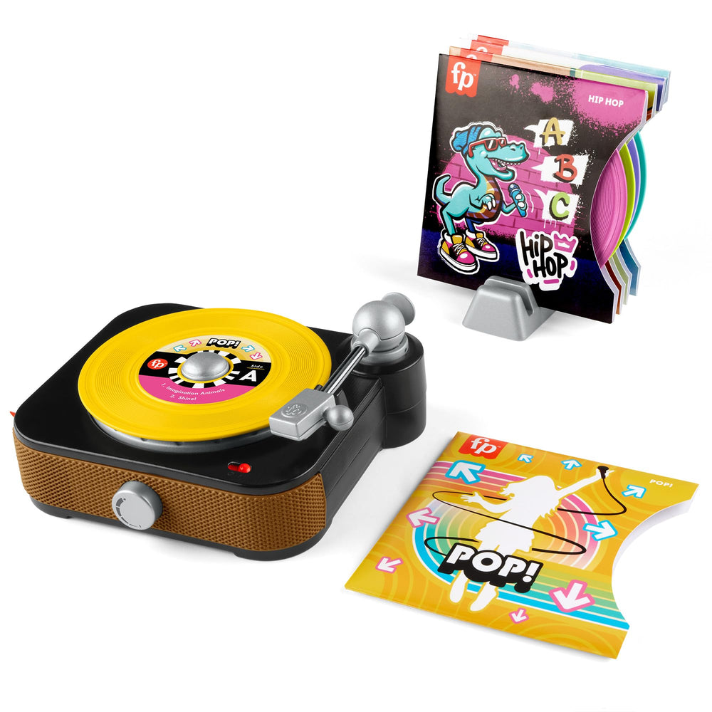 Fisher-Price Rockin’ Record Player turntable spins for imaginative pretend play.