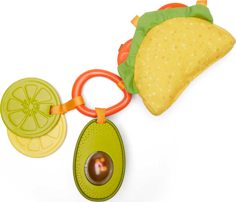 Fisher-Price avocado rattle with textured peel and spinning seed