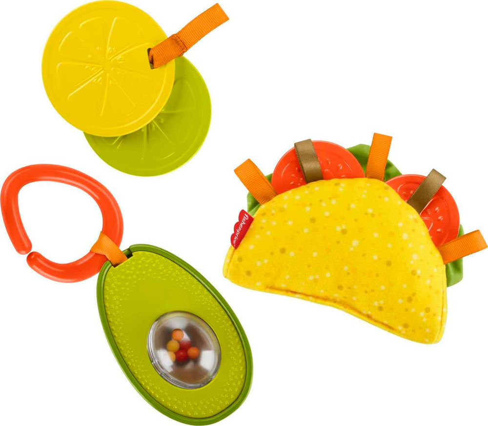 Fisher-Price avocado rattle with rollerball seed in motion for sensory play